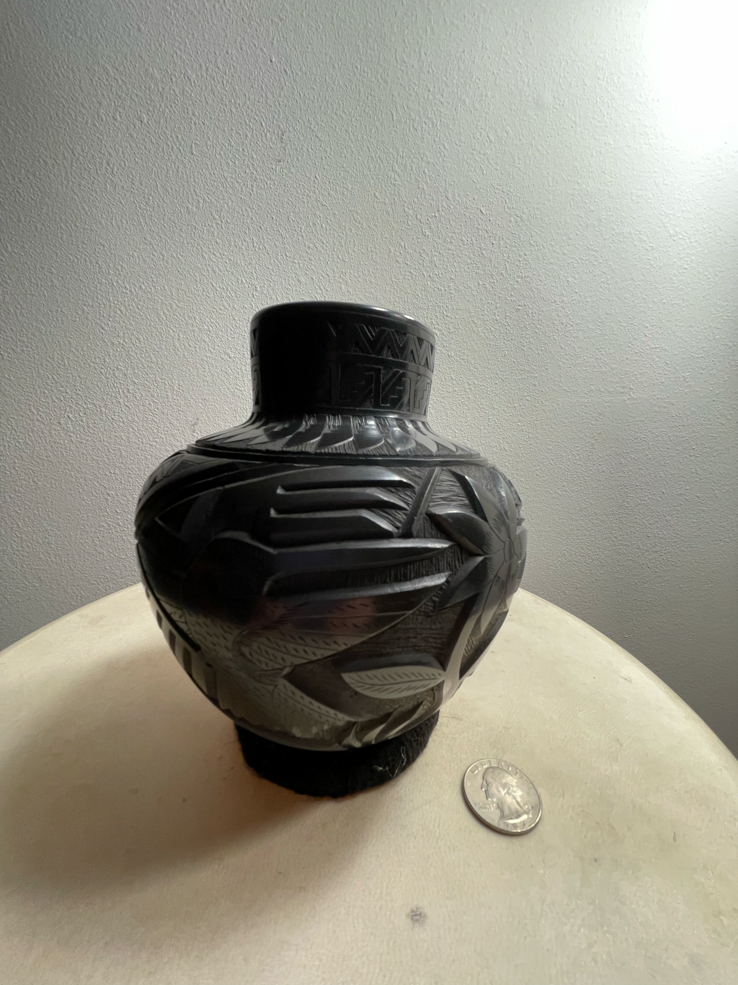 Mata Ortiz vase - black carved flower and humming bird