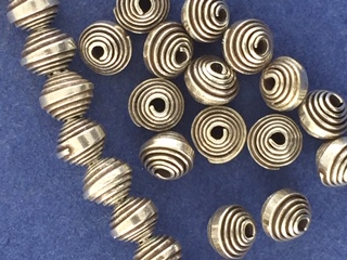 Silver Rolled Croissant Oblong Beads (thinner than pictured)